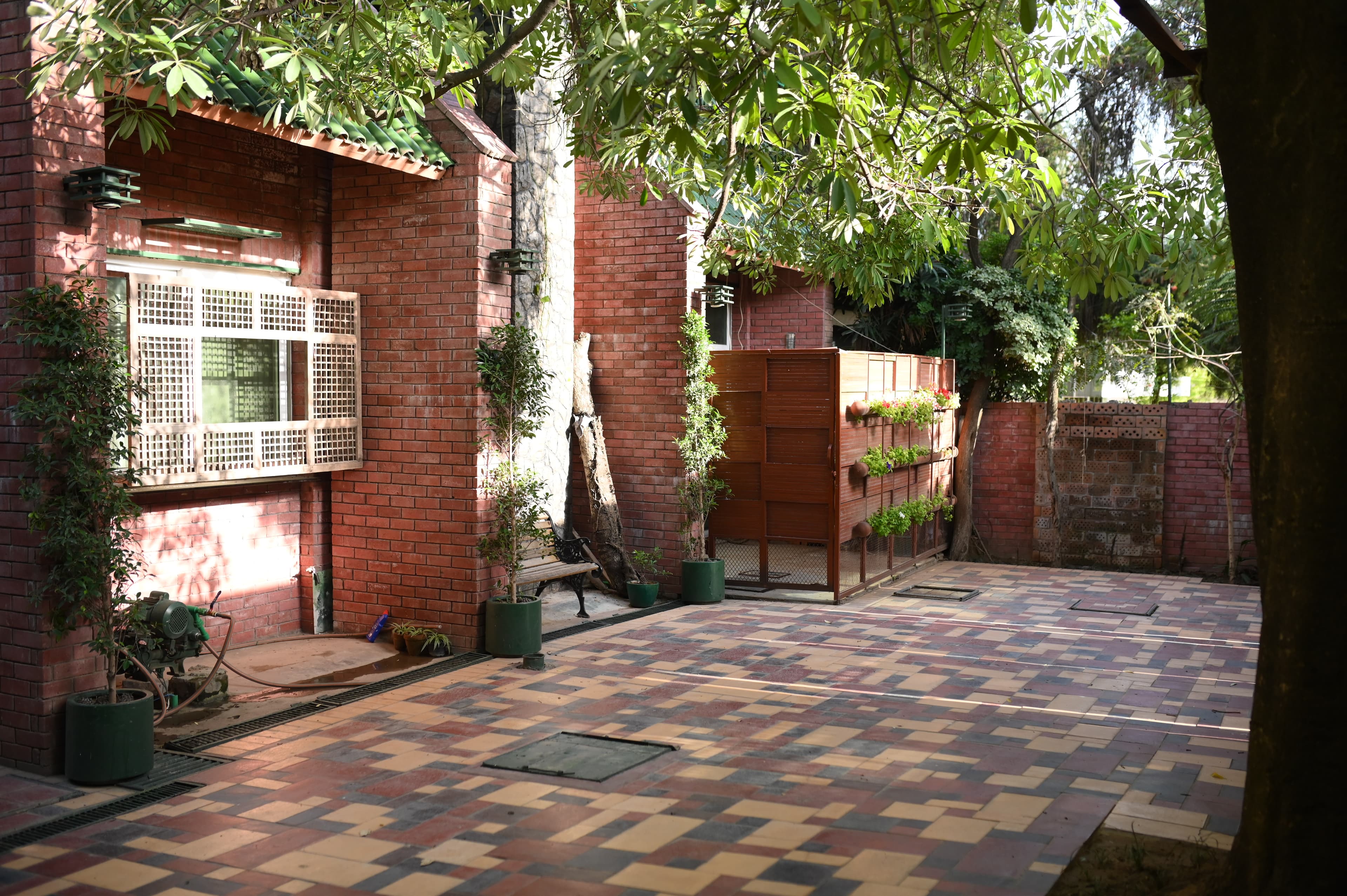 GreenLux Residency parking and guest arrival area